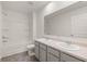 Bathroom with double sink vanity, tub/shower combo, and tile floor at 45 Vermillion Trl, Covington, GA 30016