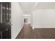 Inviting entryway with dark wood floors and ample natural light, creating a warm welcome at 45 Vermillion Trl, Covington, GA 30016
