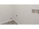 Laundry room with hookups and tile floors at 45 Vermillion Trl, Covington, GA 30016