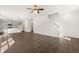 Open concept living room and kitchen featuring stainless appliances and an island at 45 Vermillion Trl, Covington, GA 30016