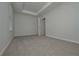 Neutral bedroom offers a calm retreat with natural light and soft carpeting at 48 Beaver Pt, Villa Rica, GA 30180