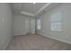 Spacious bedroom with plush carpet and a tray ceiling for added elegance at 48 Beaver Pt, Villa Rica, GA 30180