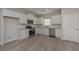 Well-appointed kitchen with stainless steel appliances, granite countertops, and white cabinets providing ample space at 48 Beaver Pt, Villa Rica, GA 30180