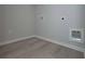 Compact laundry room with gray walls, light gray flooring, and hookups at 48 Beaver Pt, Villa Rica, GA 30180