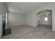 Spacious living room with hardwood floors, a fireplace, and an open layout for easy flow at 48 Beaver Pt, Villa Rica, GA 30180