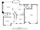 Main floor plan showing the layout of the living room, kitchen, dining room, foyer, laundry and garage at 6009 Castleton Mnr, Cumming, GA 30041