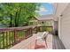 Back deck with seating and view of lush green lawn at 34 Clifton Se St, Atlanta, GA 30317