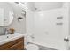 Clean bathroom featuring a vanity, toilet, and shower with modern fixtures and bright lighting at 34 Clifton Se St, Atlanta, GA 30317