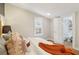 Bright bedroom with hardwood floors, complemented by neutral tones and an en-suite bathroom at 34 Clifton Se St, Atlanta, GA 30317
