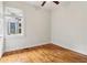 Cozy bedroom with hardwood floors and a bright window, perfect for relaxation at 34 Clifton Se St, Atlanta, GA 30317