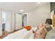 Serene bedroom with hardwood floors, adjoining the bathroom and closet for easy access at 34 Clifton Se St, Atlanta, GA 30317