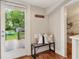 Welcoming mudroom featuring a bench, coat hooks, and access to the backyard and utility area at 34 Clifton Se St, Atlanta, GA 30317