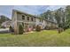 Inviting backyard showcasing a well-manicured lawn, complemented by a cozy patio area with stylish seating at 351 Gaines St, Marietta, GA 30060