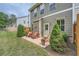 Cozy backyard patio space featuring outdoor seating, perfect for relaxing and enjoying the serene surroundings at 351 Gaines St, Marietta, GA 30060