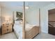Bedroom features a four poster bed, neutral carpet and decorative accents at 351 Gaines St, Marietta, GA 30060