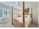 Bright bedroom features a four poster bed, neutral carpet and lots of natural light at 351 Gaines St, Marietta, GA 30060