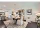 Bright dining room with hardwood floors and chandelier, perfect for Gathering gatherings at 351 Gaines St, Marietta, GA 30060