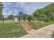 A quaint community dog park with green space, secure fencing, and well-maintained landscaping for residents and their pets at 351 Gaines St, Marietta, GA 30060