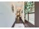 Inviting entryway with hardwood floors and modern decor leads into a bright and airy home at 351 Gaines St, Marietta, GA 30060