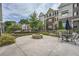 Outdoor fire pit area with seating, perfect for gatherings in a well-maintained community space at 351 Gaines St, Marietta, GA 30060