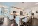 Bright, modern kitchen with island, stainless steel appliances, and dark hardwood floors at 351 Gaines St, Marietta, GA 30060