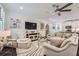 Bright living room with neutral colors, ceiling fan and open floor plan to the kitchen at 351 Gaines St, Marietta, GA 30060