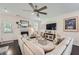 Open living room with fireplace and large sectional sofa, perfect for entertaining at 351 Gaines St, Marietta, GA 30060