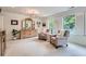 Main bedroom with large dresser, sitting area and plantation shutters at 351 Gaines St, Marietta, GA 30060