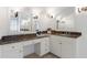 Elegant bathroom vanity with marble countertop and classic fixtures, complemented by ornate lighting and mirrors at 4470 Crestwicke Pointe, Atlanta, GA 30319