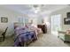 Charming bedroom with twin beds, a dresser, and a cozy chair, perfect for guests or children at 4470 Crestwicke Pointe, Atlanta, GA 30319