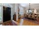 Elegant dining room featuring hardwood floors, natural light, and a chandelier at 4470 Crestwicke Pointe, Atlanta, GA 30319
