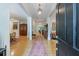 Inviting foyer with hardwood floors, elegant lighting, and an open view into the living spaces at 4470 Crestwicke Pointe, Atlanta, GA 30319
