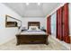 Well-lit main bedroom showcasing a large bed, neutral walls, and stylish decor at 4470 Crestwicke Pointe, Atlanta, GA 30319