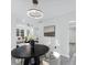 Bright dining space features a round table, stylish chairs, and modern lighting at 845 Heritage Dr, Stone Mountain, GA 30088