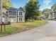 Charming two-story home featuring blue siding and white trim with a beautifully landscaped lawn at 845 Heritage Dr, Stone Mountain, GA 30088