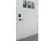 Close up of a solid core white front door with temporary hardware at 845 Heritage Dr, Stone Mountain, GA 30088