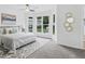 Main bedroom with a large window and geometric rug at 845 Heritage Dr, Stone Mountain, GA 30088