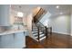 Basement features a wet bar, wood floors, and a staircase to the main floor at 22 Mount Paran Rd, Atlanta, GA 30327