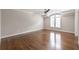 Empty bedroom features hardwood floors, high ceilings, crown molding, and a large window at 22 Mount Paran Rd, Atlanta, GA 30327