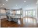 Open concept kitchen with an oversized island and stainless steel appliances at 22 Mount Paran Rd, Atlanta, GA 30327