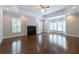 Spacious living room features a fireplace, wood floors, and lots of windows at 22 Mount Paran Rd, Atlanta, GA 30327