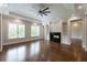 Living room with fireplace, custom built-ins and plenty of natural light at 22 Mount Paran Rd, Atlanta, GA 30327