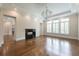 Living room with wood floors, fireplace, and natural light at 22 Mount Paran Rd, Atlanta, GA 30327