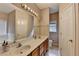 Bathroom boasts double sinks, tile flooring, vanity lighting, and soaking tub at 2694 Sterling Dr, Lawrenceville, GA 30043