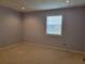 Cozy bedroom with carpet, a window and a neutral color scheme. Great for relaxation at 2694 Sterling Dr, Lawrenceville, GA 30043
