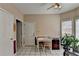 Sunlit breakfast nook boasts a breakfast table, tiled floor, and easy access to the kitchen at 2694 Sterling Dr, Lawrenceville, GA 30043