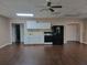 Efficient kitchen with white cabinetry, modern appliances, and an open view to the living space at 2694 Sterling Dr, Lawrenceville, GA 30043