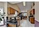 Bright kitchen with granite countertops, stainless steel appliances, and white tile floors at 2694 Sterling Dr, Lawrenceville, GA 30043