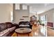 Open living room with hardwood floors, high ceilings, and large windows, creating a spacious atmosphere at 2694 Sterling Dr, Lawrenceville, GA 30043