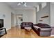 Bright living room featuring hardwood floors, high ceilings, and a view into the entryway at 2694 Sterling Dr, Lawrenceville, GA 30043